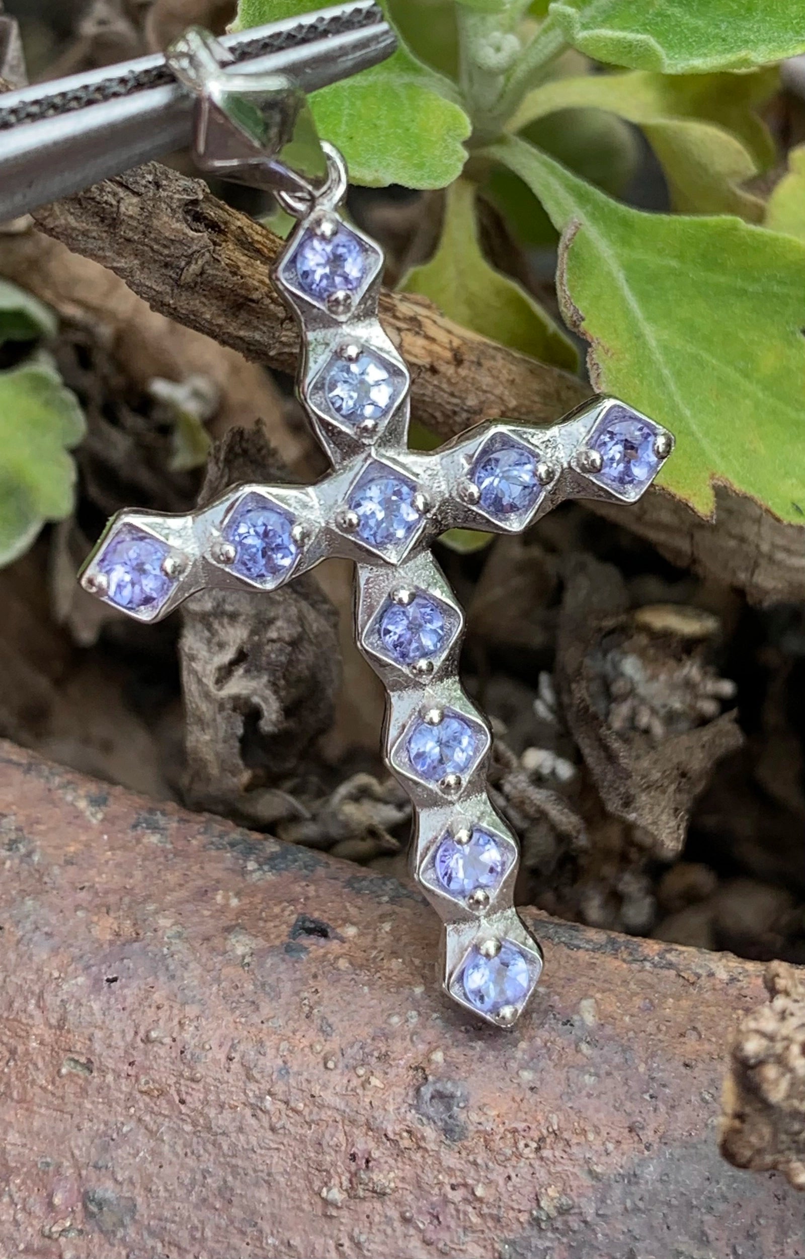 Shimmering Tanzanite and Silver Cross Pendant