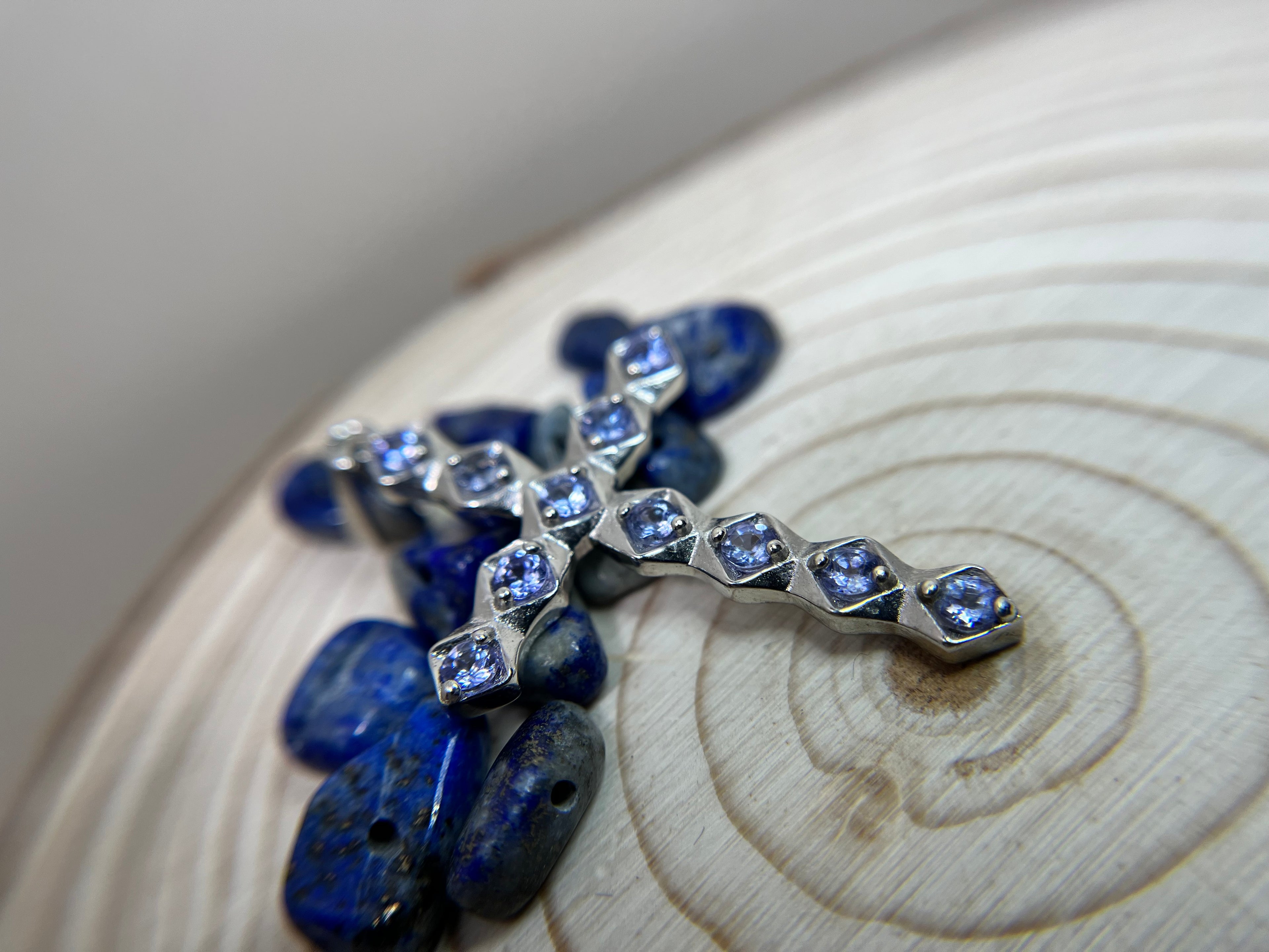 Shimmering Tanzanite and Silver Cross Pendant